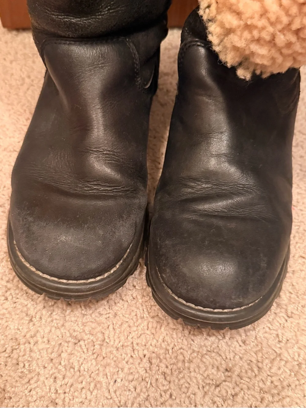 UGG Black Leather Mid-Calf Boots with Tan Shearling Lining